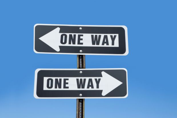 'One way' signs pointing in two directions 'One way' signs pointing in two directions