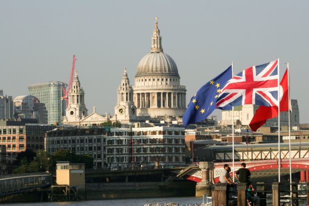 St Paul's with EU, UK flags