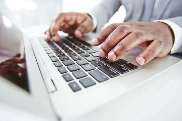 Black academic writing an application
