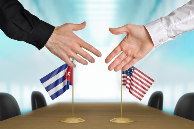 US and Cuban diplomats sign a deal