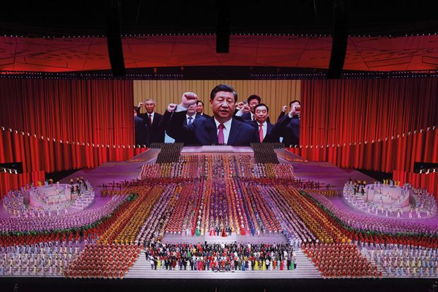 A screen shows President Xi Jinping during the art performance celebrating the 100th anniversary of the founding of the Communist Party of China on June 28, 2021 in Beijing A large screen showing President Xi Jinping during the art performance celebrating the 100th anniversary of the founding of the Communist Party of China on June 28, 2021 in Beijing, new Cold War.