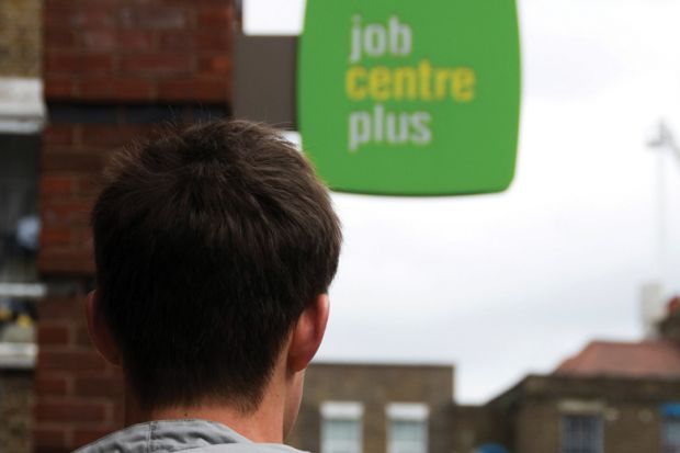 Young man looking at the job centre Young man looking at the job centre