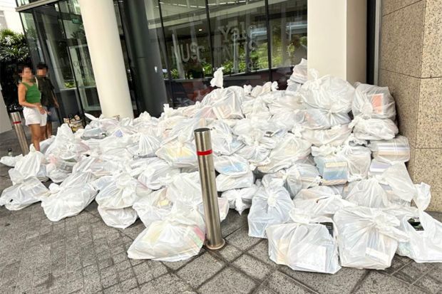 Books bagged for disposal outside Yale-NUS College