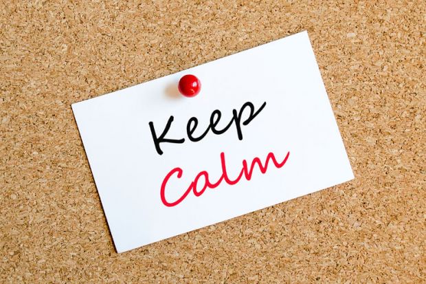 'Keep calm' note pinned to corkboard 'Keep calm' note pinned to corkboard
