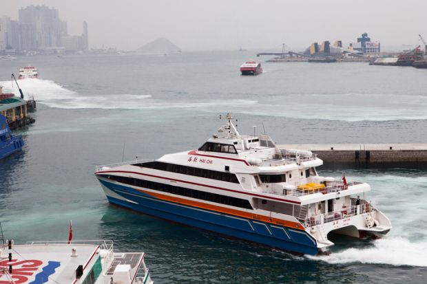 Kowloon, Hong Kongaa March 15 2013 Passenger Ferry to China leaves Kowloon terminal, Hong Kong on March 15th, 2013