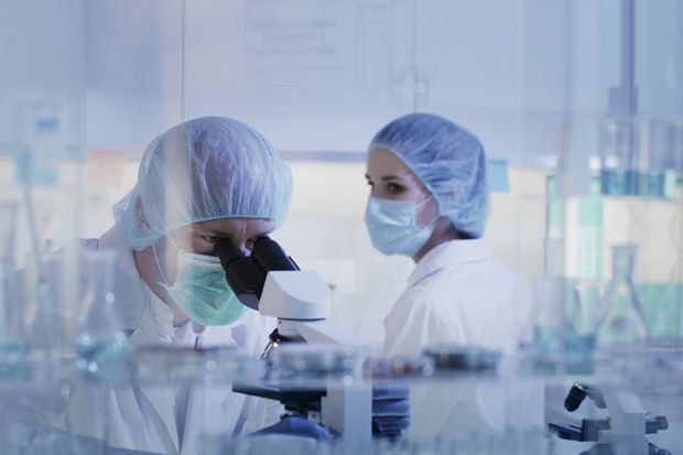 Two people in lab Two people in lab