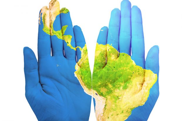 Map of Latin America projected on to hands Map of Latin America projected on to hands