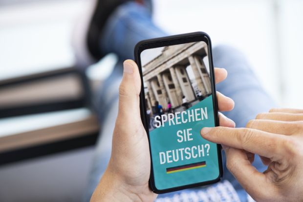 German language lesson on a smartphone German language lesson on a smartphone illustrating a story about language proficiency in Germany universities