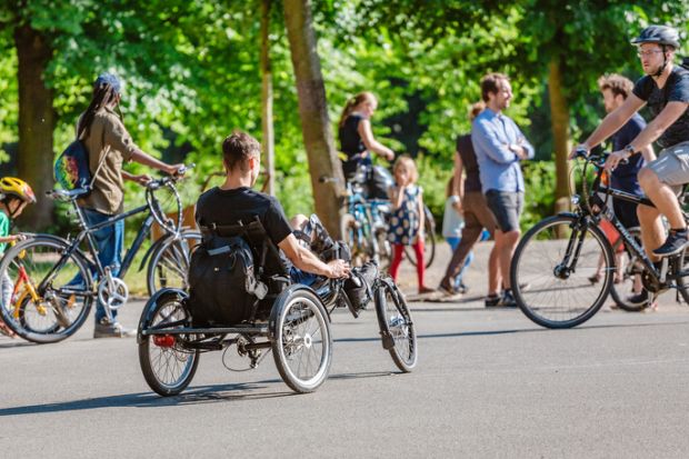 Leipzig, Germany - May 21, 2018 disabled man on the special handbike bicycle
