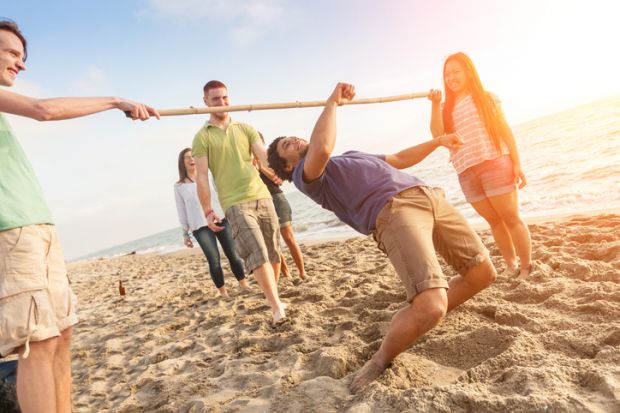 People dancing under a limbo bar People dancing under a limbo bar symbolising the balance between pension payments and benefits