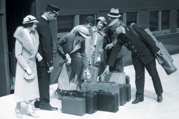 Train passengers identifying luggage for porter Train passengers identifying luggage for porter