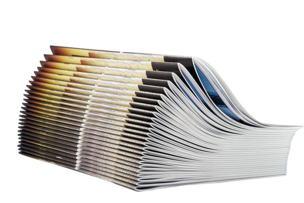A pile of identical magazines A pile of identical magazines