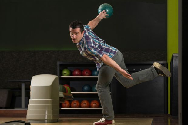 Man in dramatic bowling pose Man in dramatic bowling pose