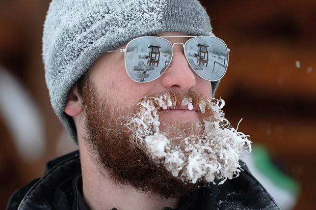 man with frozen beard, Lake Louise, Canada man with frozen beard, Lake Louise, Canada