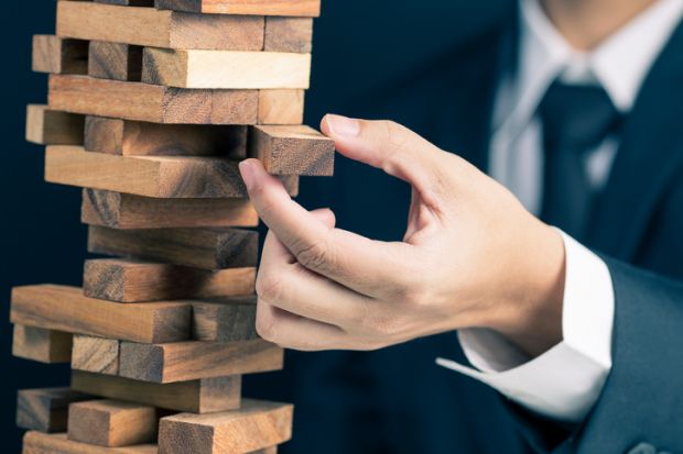 Man playing Jenga