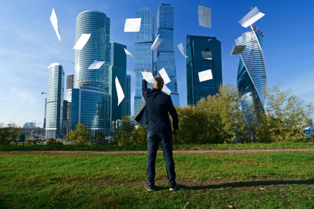Man throws paper