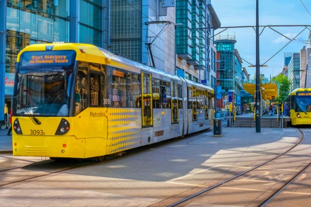 Metrolink tram in the city center of Manchester, UK