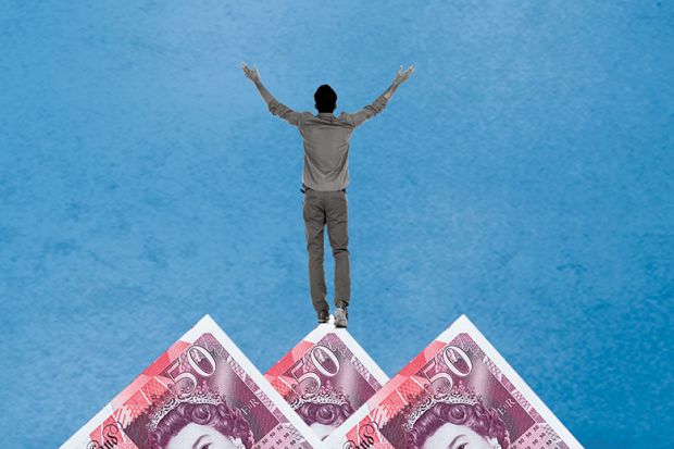man on mountain of money