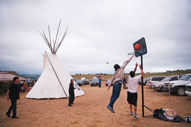 Native American protesters play basketball Native American protesters play basketball