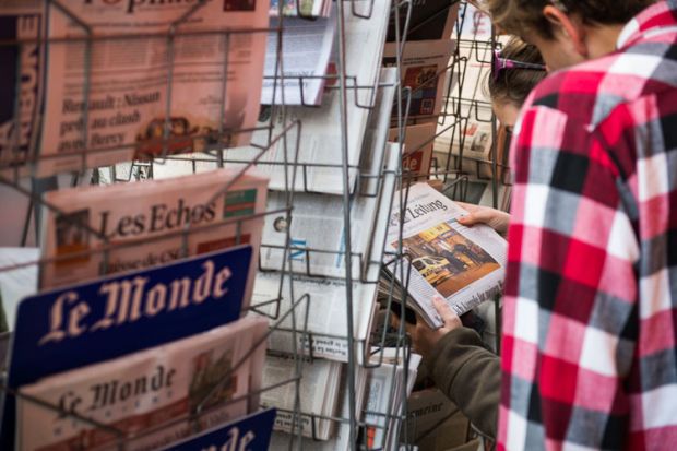 newspaper-kiosk-in-paris-day-after-terrorist-attacks-in-november-2015 newspaper-kiosk-in-paris-day-after-terrorist-attacks-in-november-2015