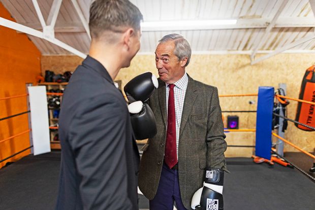 Leader of the Reform Party Nigel Farage poses for a picture with Mayoral Candidate Luke Campbell in the Boxclub Boxing Centre on 25 April, 2025 in Hull, England. To illustrate that vice-chancellors are warned against ignoring rise of populist party