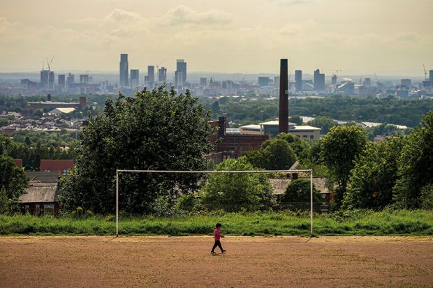 A general view of an old cotton mill in Oldham with the city of Manchester on the horizon, 2020 A general view of an old cotton mill in Oldham with the city of Manchester on the horizon, 2020