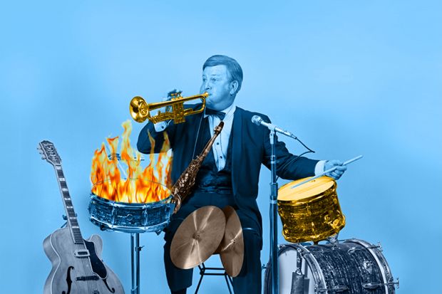 One-man band with instruments coloured gold, silver and bronze, and a drum on fire. To illustrate that the Teaching Excellence Framework may be trying to do too much and is at risk of self-combusting.