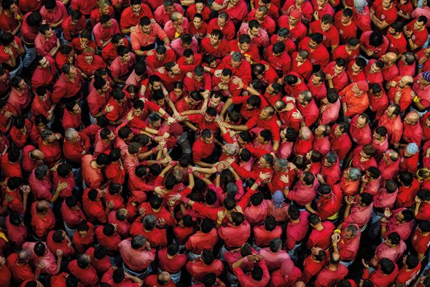 Crowd of people dressed in red