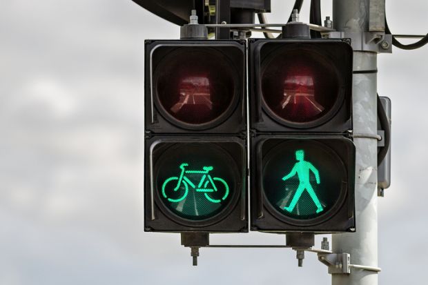 Pedestrian and cyclist traffic signal Pedestrian and cyclist traffic ‘Go’ signal representing approval of ARC grant funding