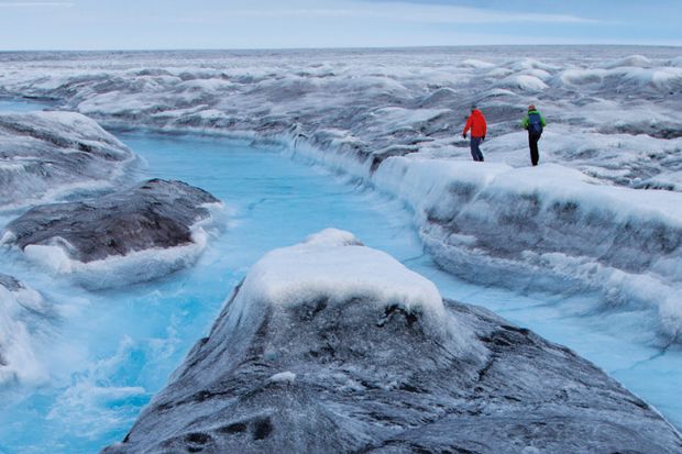 People walking in Greenland for Sara Penrhyn Jones' film Timeline