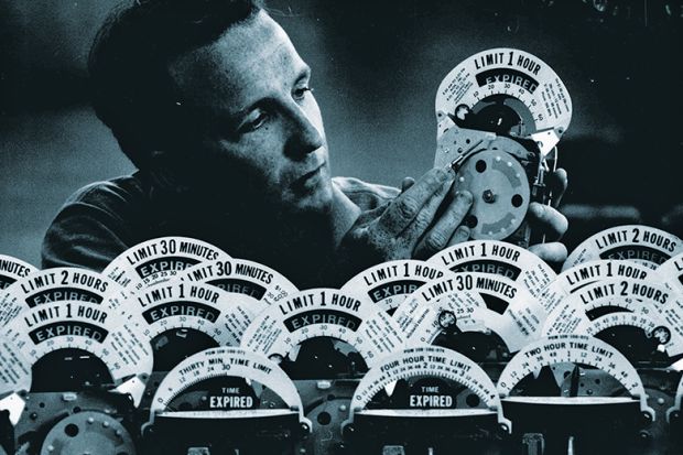 Man inspects expired metres Man inspects expired metres