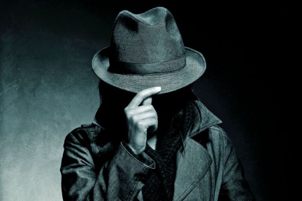 Person hiding face with hat brim Person hiding face with hat brim