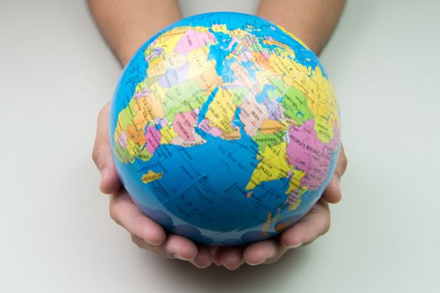 Person holding world in hands (university rankings)