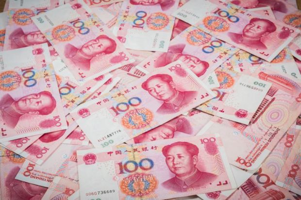 Pile of Chinese currency 100s of yuan Pile of Chinese currency 100s of yuan
