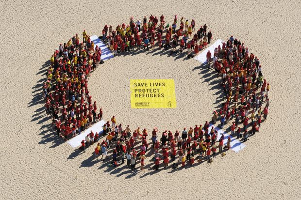 Protesters form giant circle on Bondi Beach, Australia Protesters form giant circle on Bondi Beach, Australia