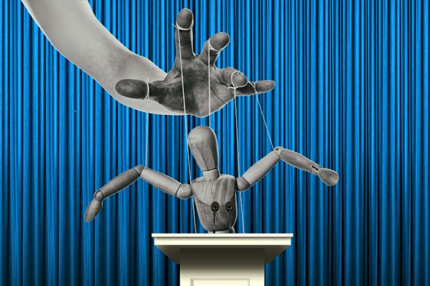 Puppet at a lectern. To illustrate comments made by David Willetts that government should stop trying to micromanage university provision