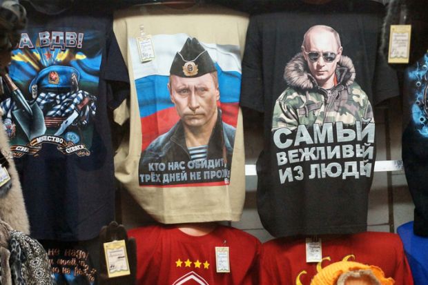 Russian president Vladimir Putin pictured on t-shirts in a Moscow shop Russian president Vladimir Putin pictured on t-shirts in a Moscow shop