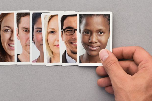 Recruiter browsing photos of potential candidates Recruiter browsing photos of potential candidates