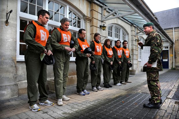 A recruiting officer with a chart of tests for potential recruits at the Army Officer Selection Board at Westbury, Wiltshire UK. To illustrate that universities could conduct more research in partnership with the defence sector