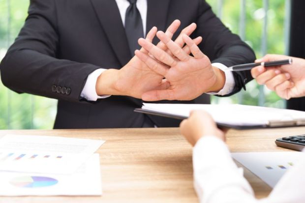 Rejection of deal, illustrating an article about open access negotiations, the HE sector, Elsevier and Jisc