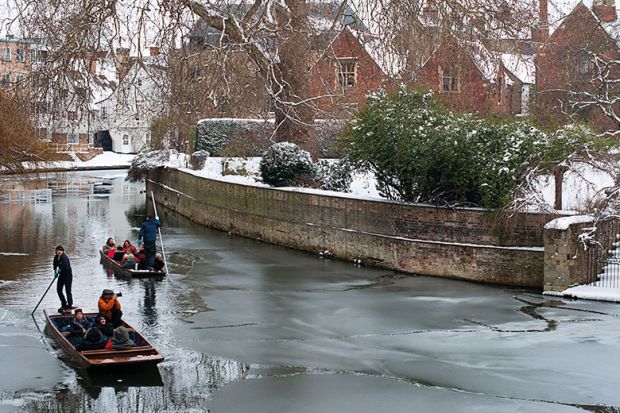 Punting down river in winter Punting down river in winter