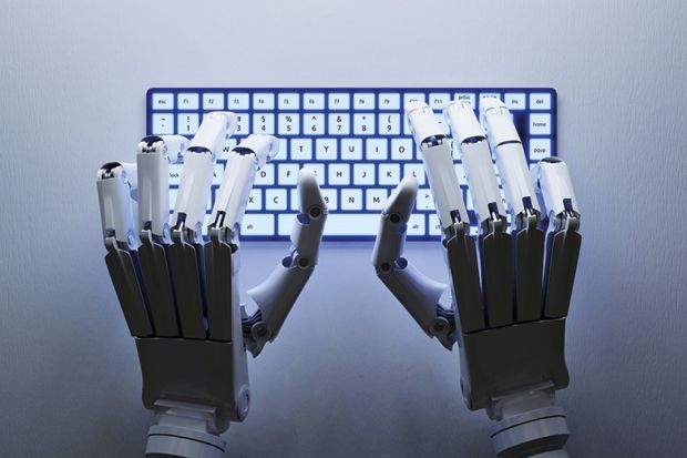 Robot typing on keyboard