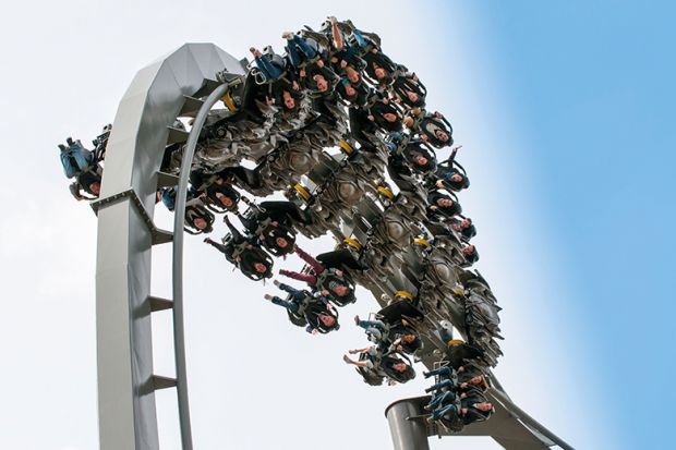 A roller coaster at the top of a loop A roller coaster at the top of a loop