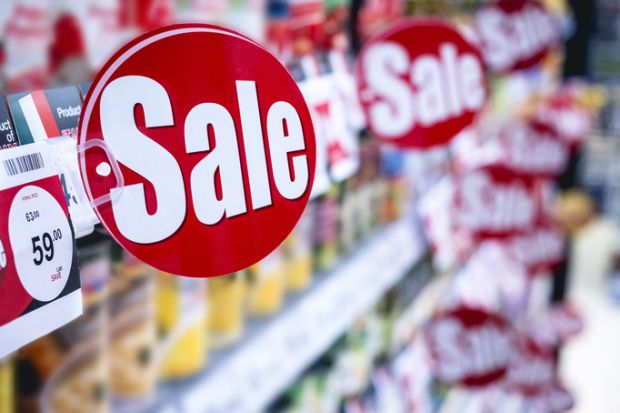 Sale sign in a supermarket Sale sign