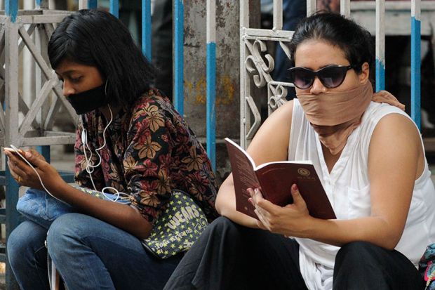 scarves-over-mouths scarves-over-mouths