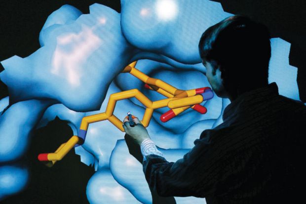 Scientist Nathan Brown moves 3D model of HSP90 protein Scientist Nathan Brown moves 3D model of HSP90 protein