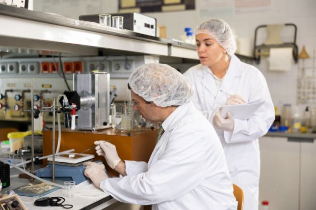 scientists chemists conduct experiments in the laboratory