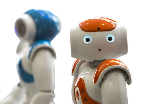 Small robots with human face and body Small robots with human face and body