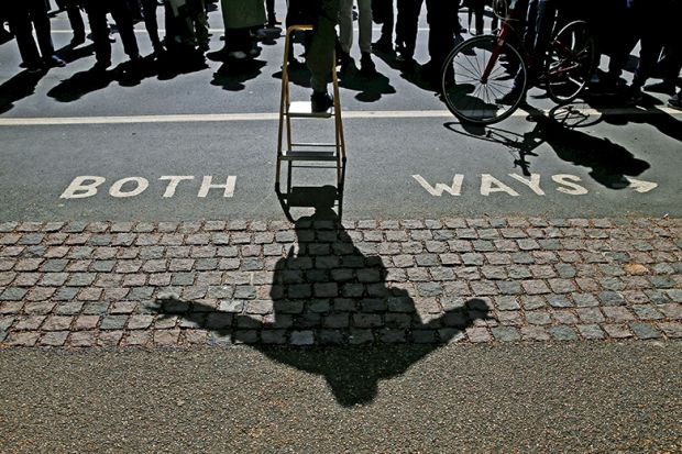 A speaker casts a shadow as he addresses a crowd at Speakers’ Corner in Hyde Park, London A speaker casts a shadow as he addresses a crowd at Speakers’ Corner in Hyde Park, London