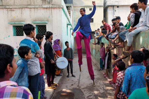 Stilt walkers in India Stilt walkers in India
